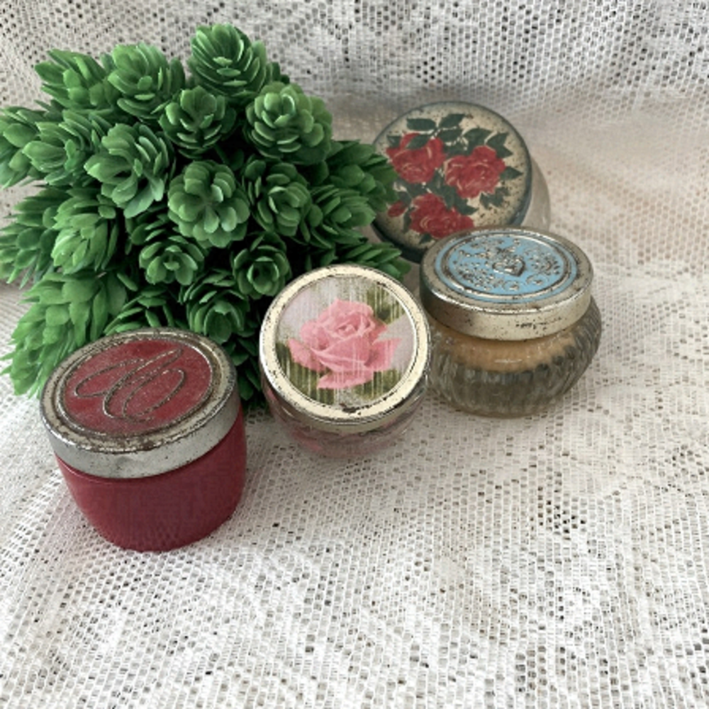 Set of 4 vintage cream lotion jars by Avon (not sure about the larger clear 1)